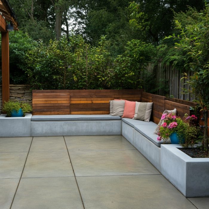 Concrete,Patio,With,Concrete,Planters,And,Seating